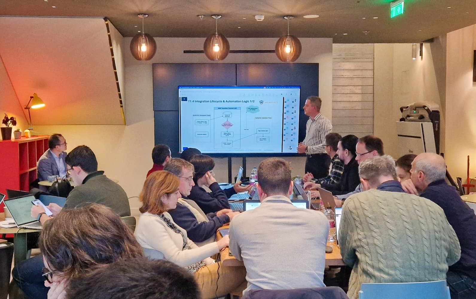 Person presenting in a conference room