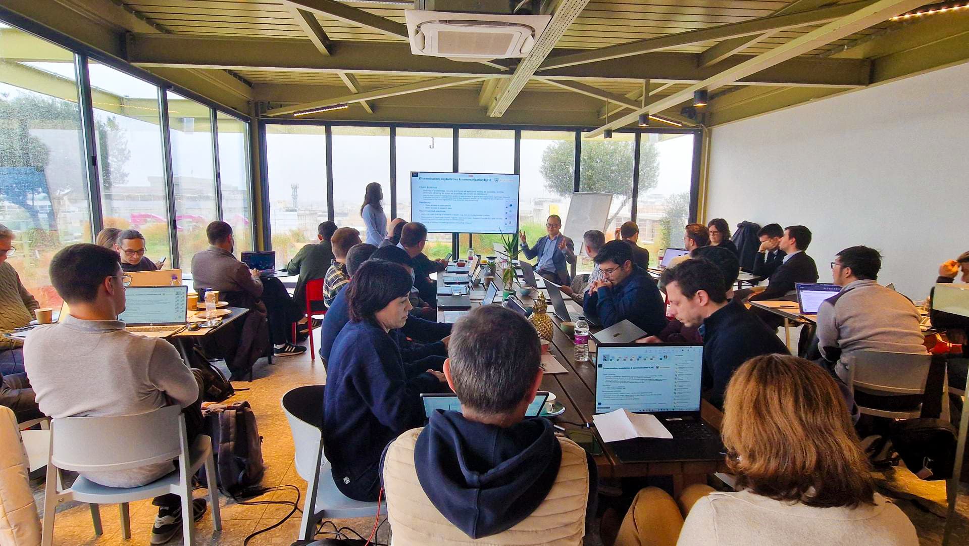 People attending a meeting in a conference room